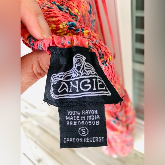 Floral Split front romper with attached shorts and smock halter top. - Picture 8 of 13